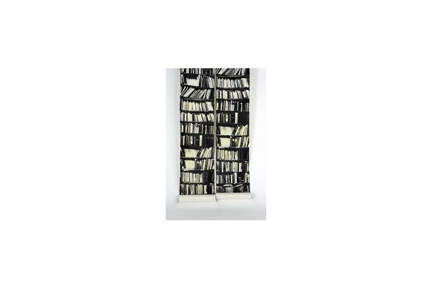 'Genuine' fake bookshelf wallpaper designed by Deborah Bowness