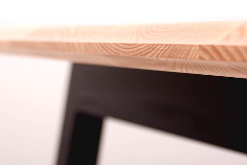 The Pi table features a grained Ash surface