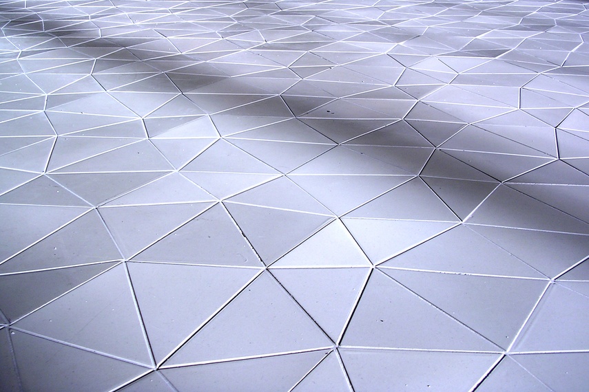 Each tile is a hexagon that has been subdivided into six triangles.